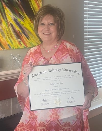 Cathy with diploma