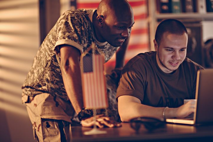 military student on laptop